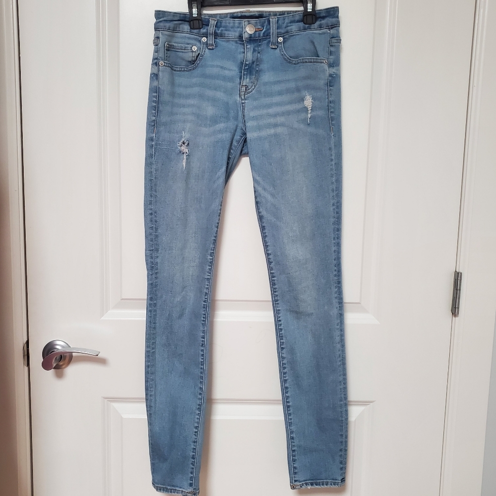 Aero Women's Low Rise Light Blue Distressed Jeans Size 8 Long